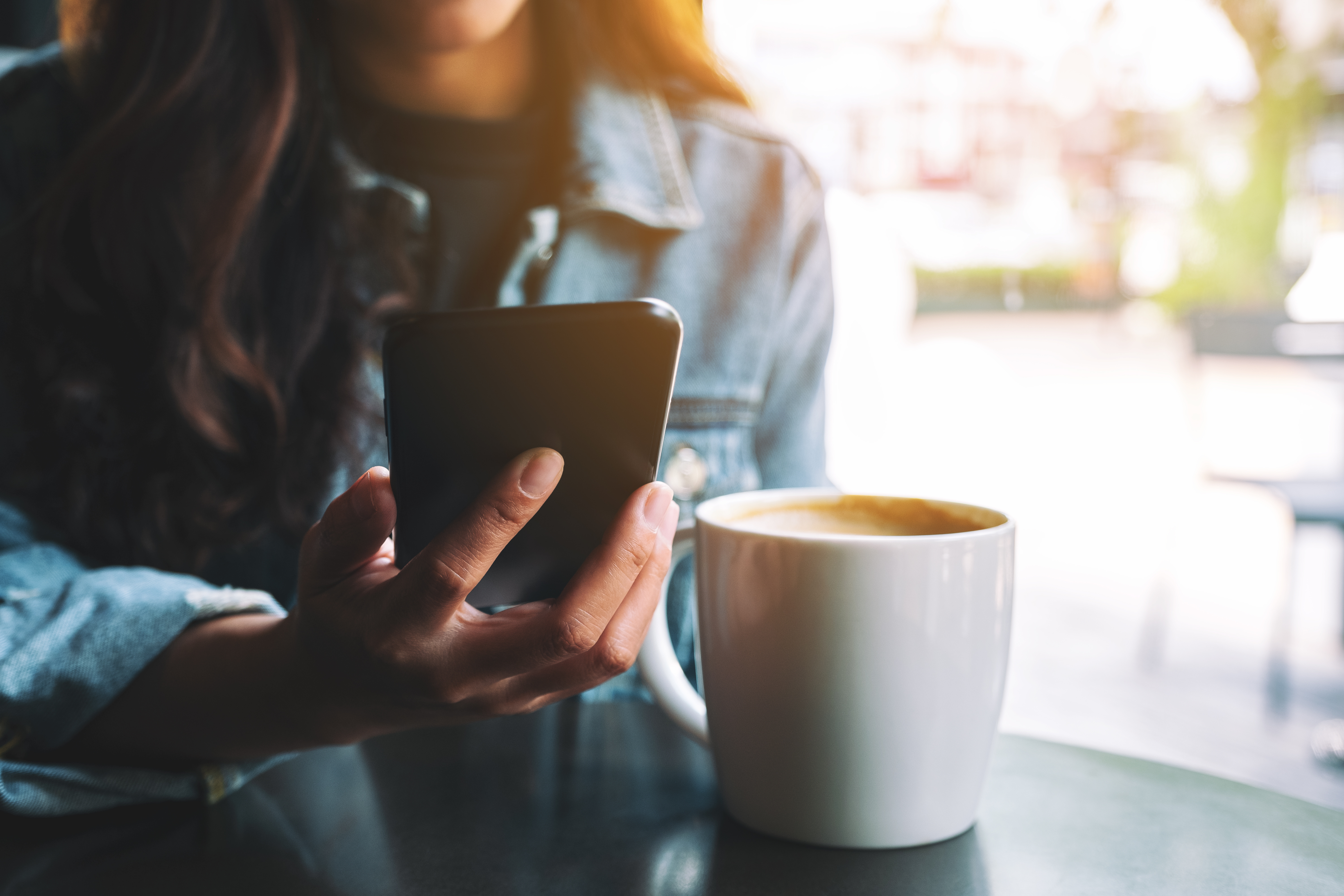 Woman on phone completing a Schedule Service appointment form